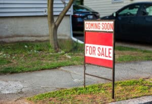 home coming soon for sale sign